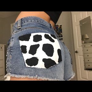 american eagle painted cow print denim shorts